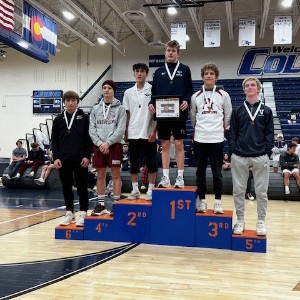 Wrestlers on podium 